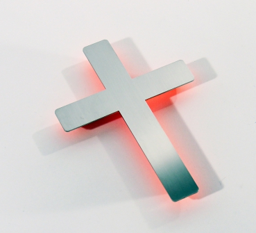 Kreuz, Wandkreuz Edelstahl poliert -Orangefarbener Hintergrund-
